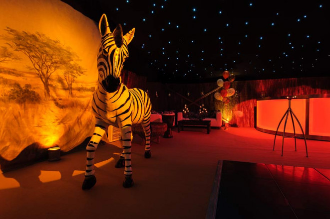 African savanna decorations in themed party marquee