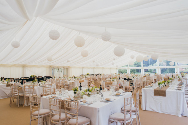Wedding marquee uniquely styled with ivory pleated lining