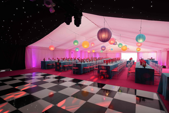Chequered dancefloor in marquee for birthday party