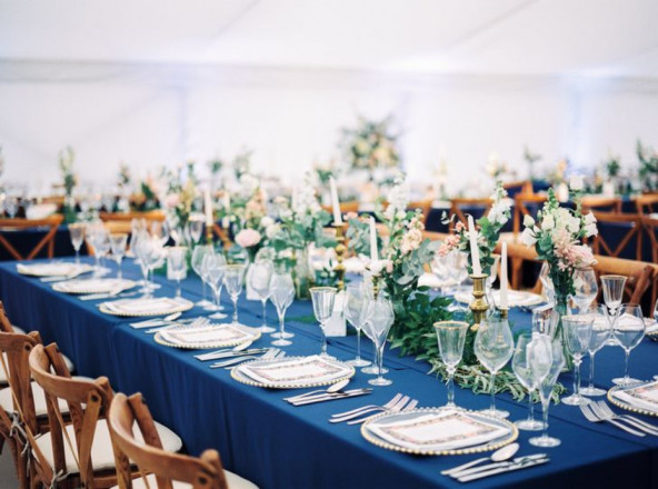 Vintage themed table layout for wedding held in marquee
