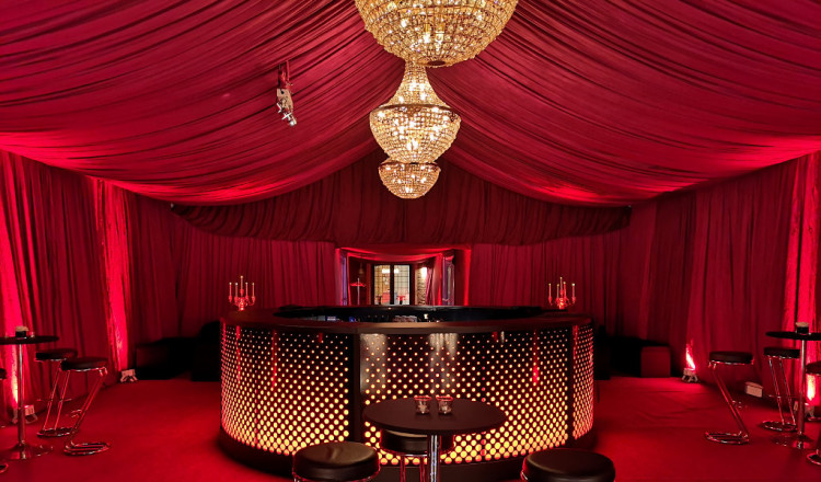 Bar area in party marquee themed red and gold