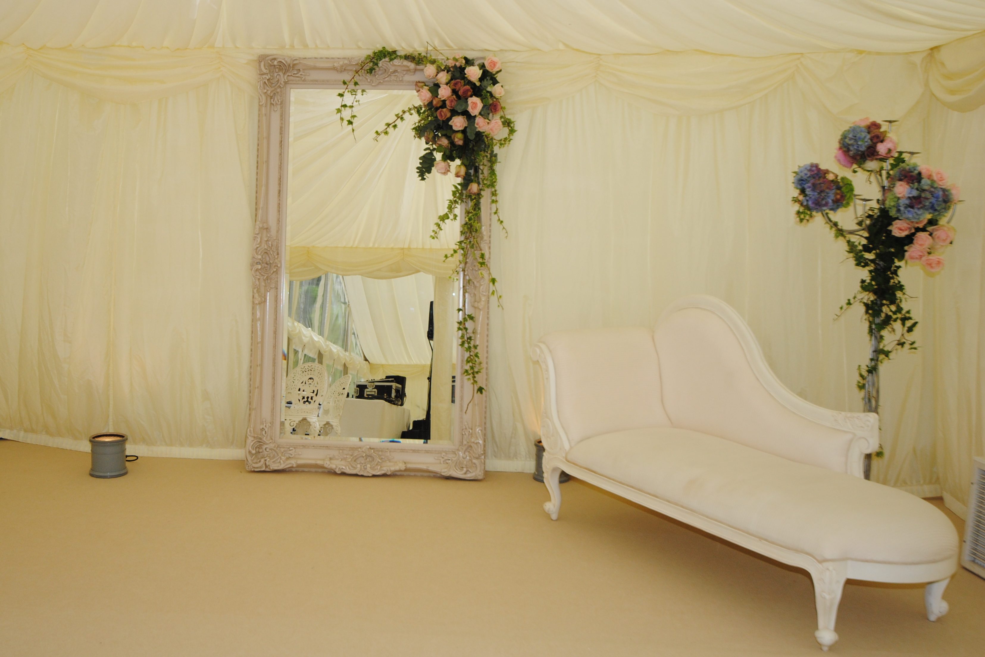 chaise lounge in a wedding marquee