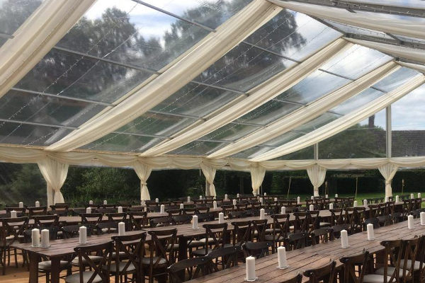 Ivory roof overlays dressing a clear roof marquee